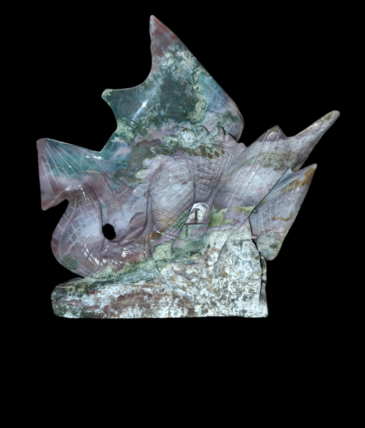 hand carved Ocean Jasper Dragon sitting on the steps. WOW! look at all the detail in the dragon. Absolutely breathtaking.